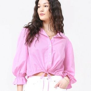 Xirena Elody Top. Can be worn more cropped or not.